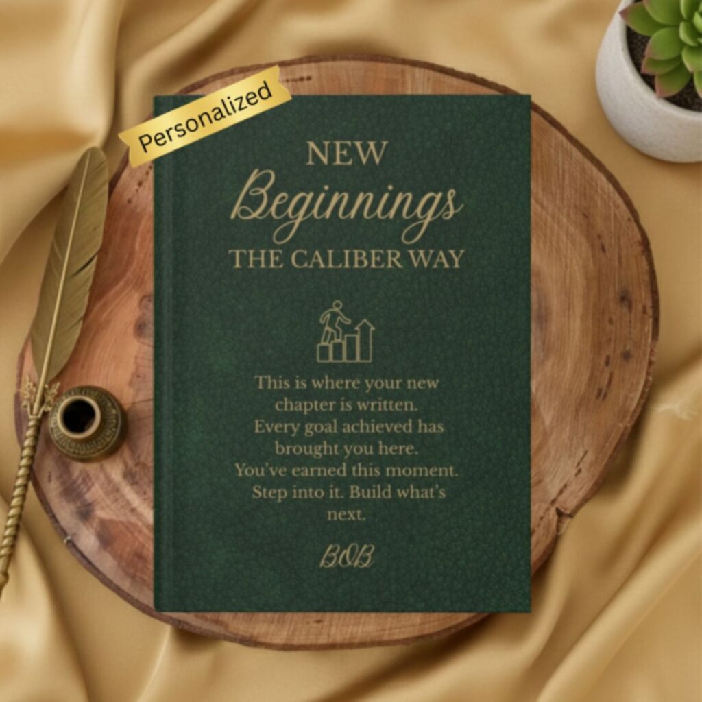 Personalized New Beginnings journal in dark green and gold with custom name BOB, displayed on a wooden board.