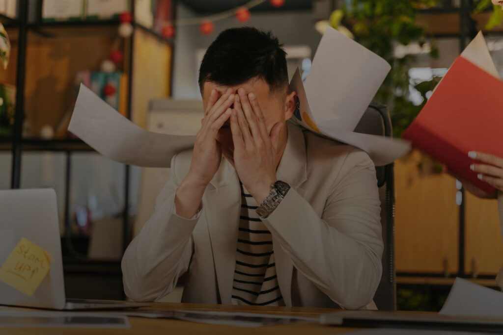 overwhelmed entrepreneur experiencing burnout from overgiving and constant responsibility