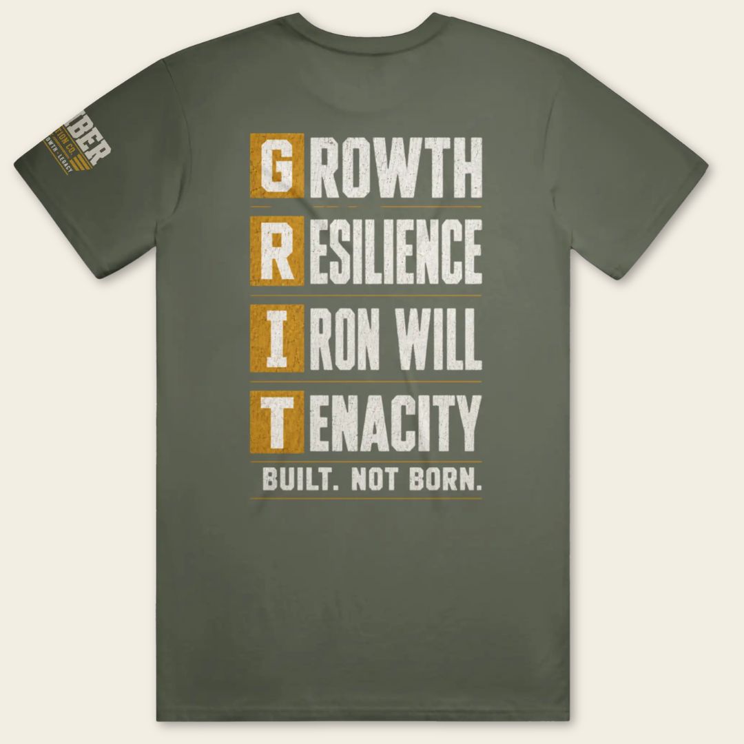 Back view of the BUILD GRIT Premium T-Shirt in Military Green featuring the GRIT acronym design with Growth, Resilience, Iron Will, and Tenacity, plus the Caliber Motivation Co. sleeve patch.