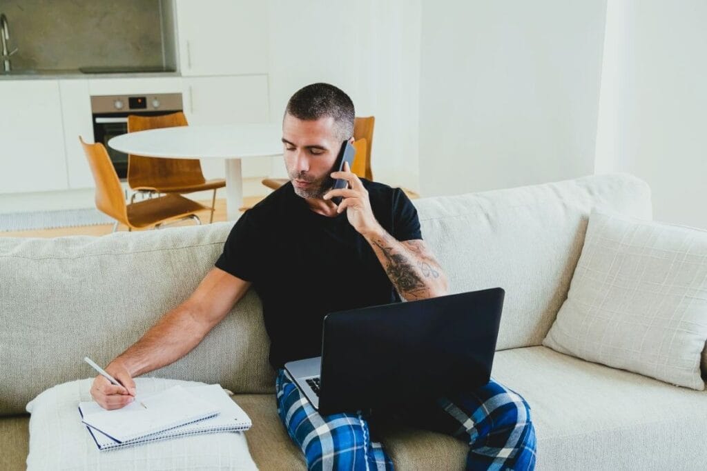 Man managing his own business from home—one of the reasons to become an entrepreneur