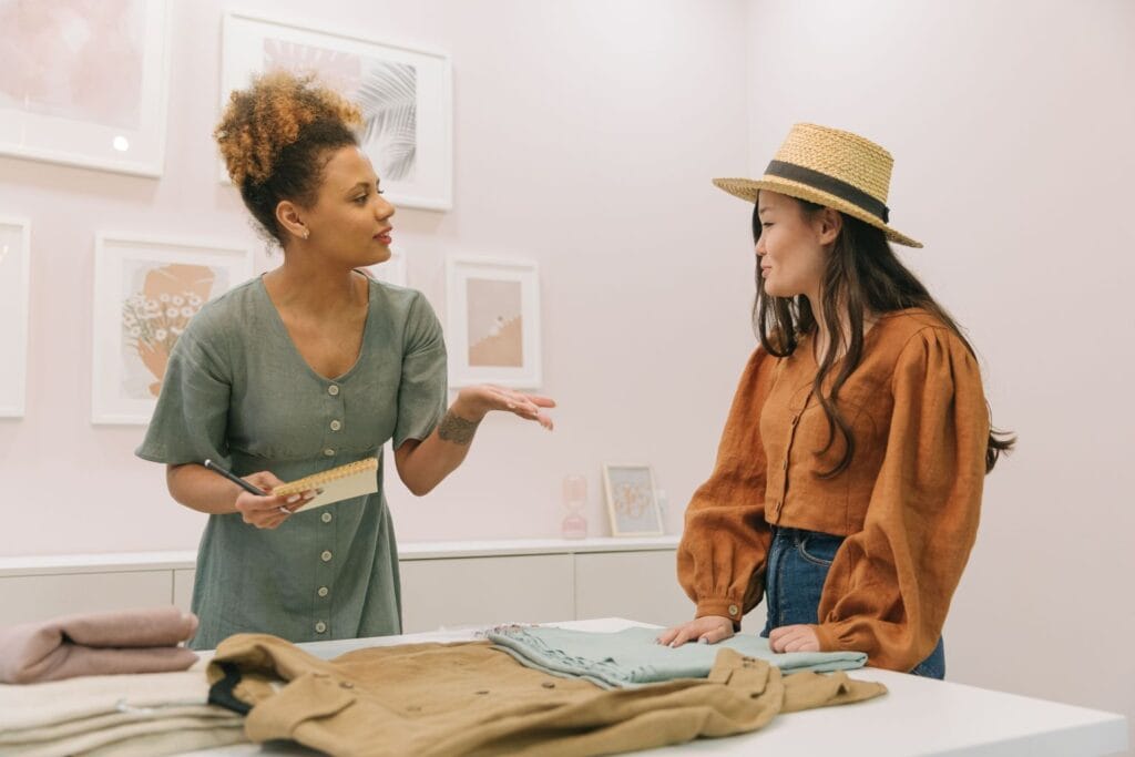 Entrepreneur showing a product to a customer while testing a business idea before taking a major risk