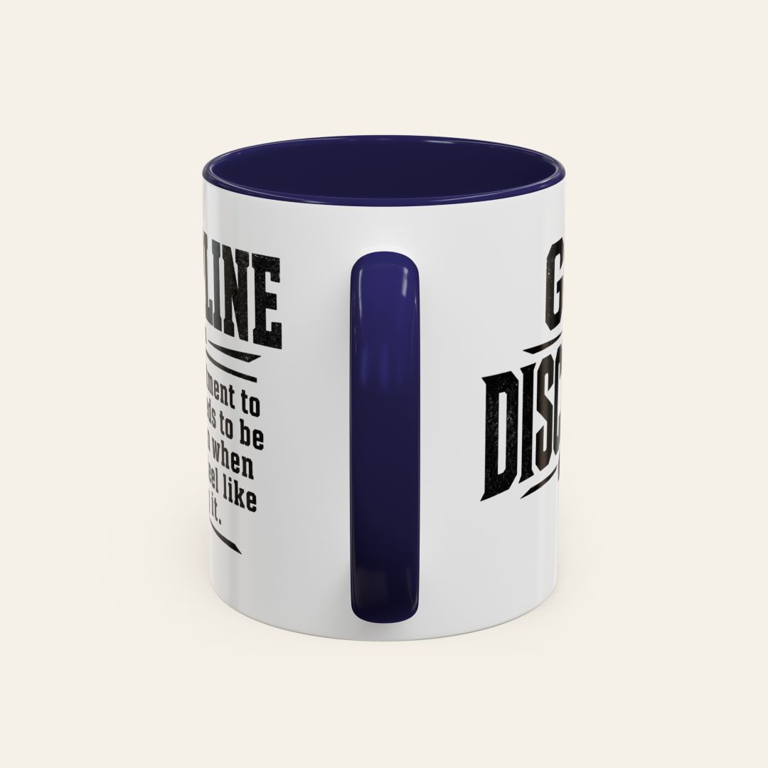 Rear handle view of the Got Discipline 11 oz motivational coffee mug, featuring a navy blue handle and interior with distressed black lettering on both sides.