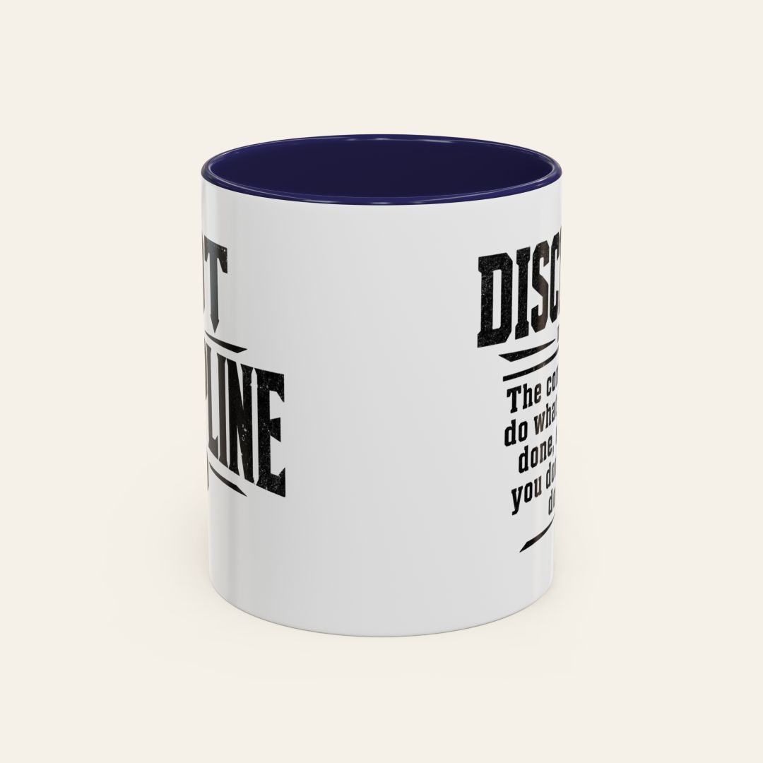 Side view of the Got Discipline 11 oz motivational coffee mug with a navy blue interior, showing the two-sided distressed black lettering design.