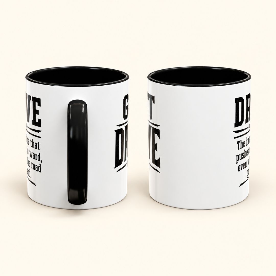 Got Drive motivational coffee mug, 11 oz black-accent ceramic mug shown from two side angles, highlighting the black handle and wraparound two-sided design.